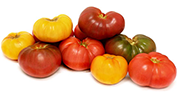 Multicolored heirloom tomatoes in a pile