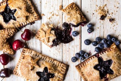 Fresh baked hand pies filled with fruit and various berries